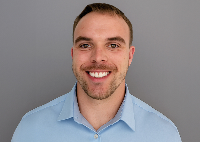 A portrait of Nate Vomhof, UW Credit Union member and professional photographer.