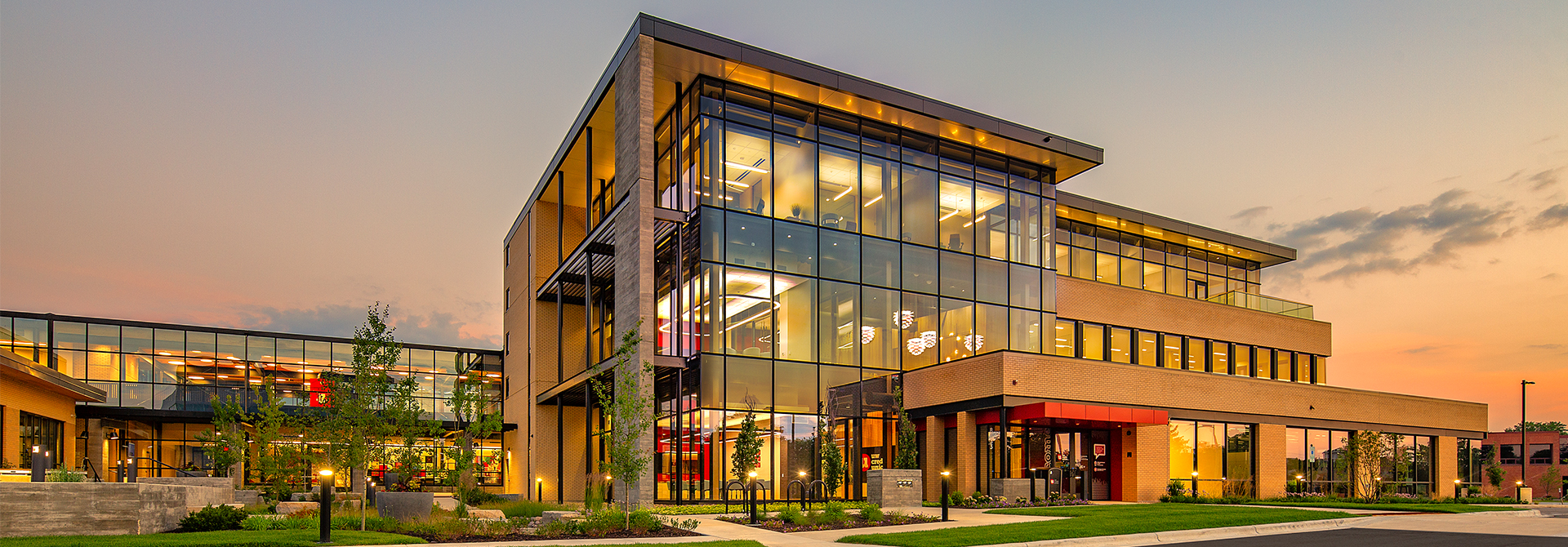 An exterior image of UW Credit Unions Corporate Campus, pictured at sunset.