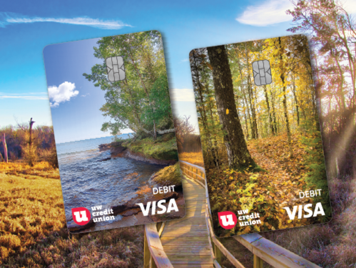 An image featuring two new nature inspired UW Credit Union debit card designs over a boardwalk trail backdrop. 